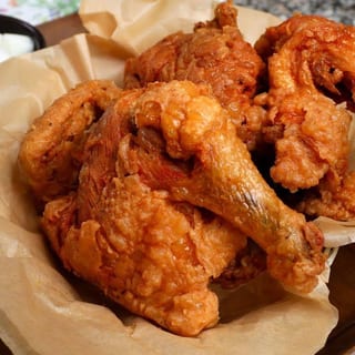 1 Fried whole Chicken in Flavorful herbs & spices